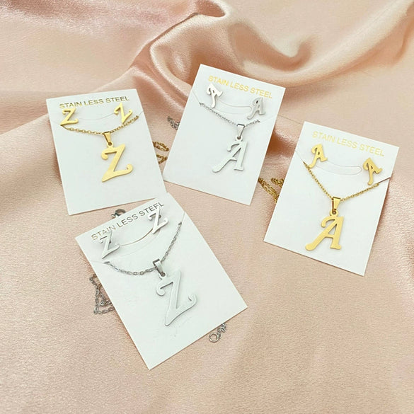 Women's Stainless Steel Alphabet Letter Pendant Necklace And Earring Set With Electroplated Finish And Simple Ochain Design