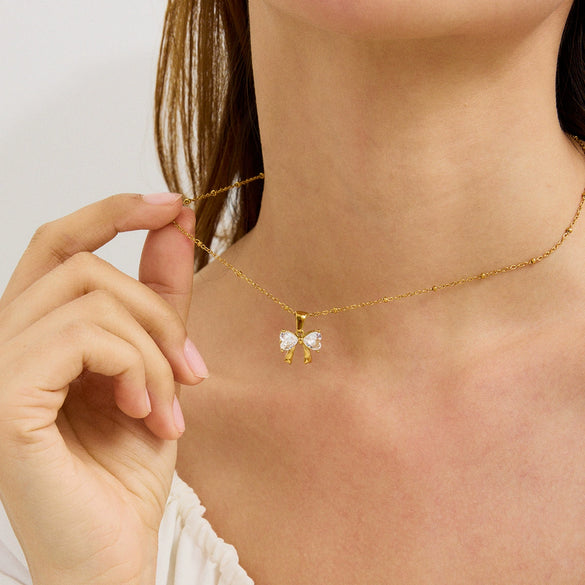 Women's Stainless Steel And Titanium Steel Bow Inlaid Zircon Pendant Necklace With Electroplating