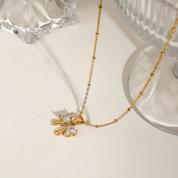 Women's Stainless Steel And Titanium Steel Bow White Zircon Pendant Necklace With Electroplating