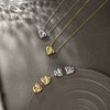 Women's Stainless Steel And Titanium Steel Jewelry Set With Heart Water Drop Bell Pattern Electroplated Design