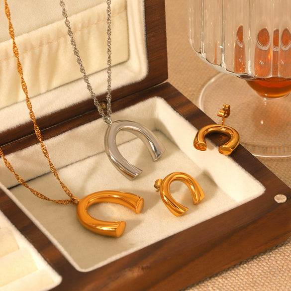 Women's Stainless Steel And Titanium Steel Water Wave Chain Ushaped Geometric Pendant Necklace And Earrings With Electroplating