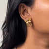 Women's Stainless Steel Bow Pattern Electroplated Titanium Steel Earrings With Golden Hammer Pattern Fashionable And Simple