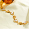 Women's Stainless Steel Bracelet With 18K Gold Vacuum Plating Pearl And Rhinestone Accents And Heart Shaped Geometric Design