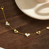 Women's Stainless Steel Bracelet With 18K Vacuum Plating White Shell Inlay Geometric Heart Pattern And Hollow Heart Design