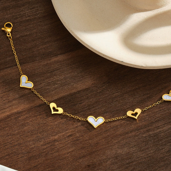 Women's Stainless Steel Bracelet With 18K Vacuum Plating White Shell Inlay Geometric Heart Pattern And Hollow Heart Design