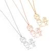 Women's Stainless Steel Familythemed Doll Pendant Necklace With Ochain And Cartoon Character Design Electroplated Finish