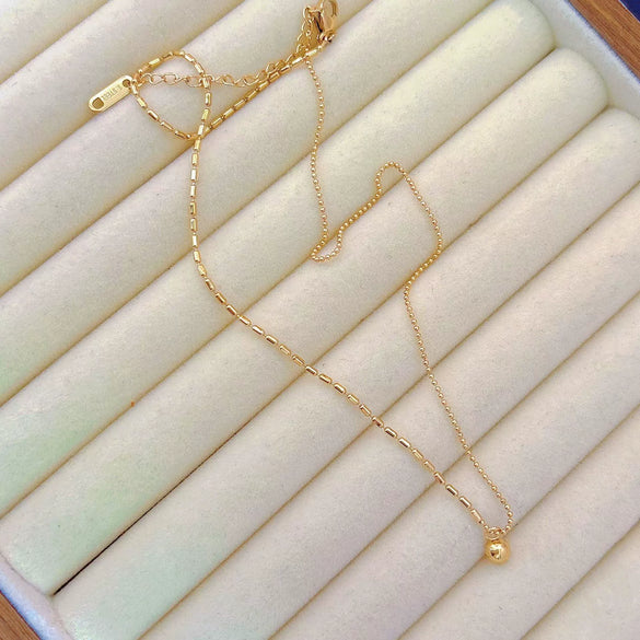 Women's Stainless Steel Geometric Round Bead Gold Bean Necklace With Electroplated Design And Rice Grain Wave Bead Chain