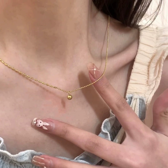 Women's Stainless Steel Geometric Round Bead Gold Bean Necklace With Electroplated Design And Rice Grain Wave Bead Chain