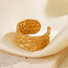 Women's Stainless Steel Geometric Wide Face Hammer Pattern Open Ring With Real Gold Plating And Flower Design