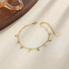 Women's Stainless Steel Heart Cross Pendant Anklet With Gold Tone Finish Star Pattern And Glass Diamond Accents On A Thin Chain