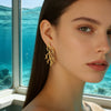 Women's Stainless Steel Jellyfish And Fish Tail Earrings Vacation Style Animal Shape Stamped Light Luxury Versatile Fashion Earrings