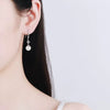 Women's 925 Sterling Silver Freshwater Pearl And Moissanite Drop Earrings Geometric Floral Four Prong Ear Hook Design