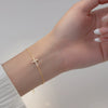 Women's Sterling Silver Geometric Cross Bracelet With Diamond Design