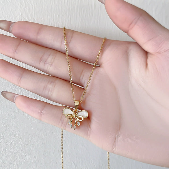 Women's Titanium Steel And Copper Geometric Bow Pendant Necklace With Real Gold Electroplated And Diamonds
