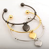 Women's Titanium Steel And Leather Cord Heart Shape Pendant Bracelet With Geometric Pattern And Electroplating