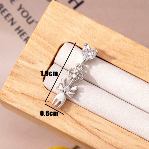 Women's Titanium Steel Bow Inlaid Zircon Personality Ear Nail