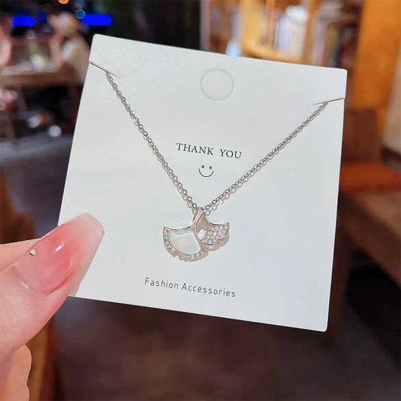 Women's Titanium Steel Copper Microinlaid Zircon Ginkgo Leaf Pendant Necklace With Diamond Design