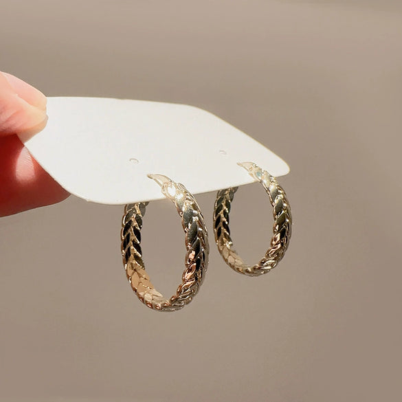 Women's Titanium Steel Geometric Pattern Polished Wheat Ear Woven Elegant Earrings