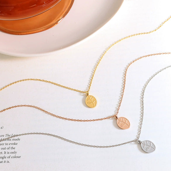 Women's Titanium Steel Gold Plated Leaf Oval Pendant Necklace Geometric Clavicle Chain With Electroplated Finish