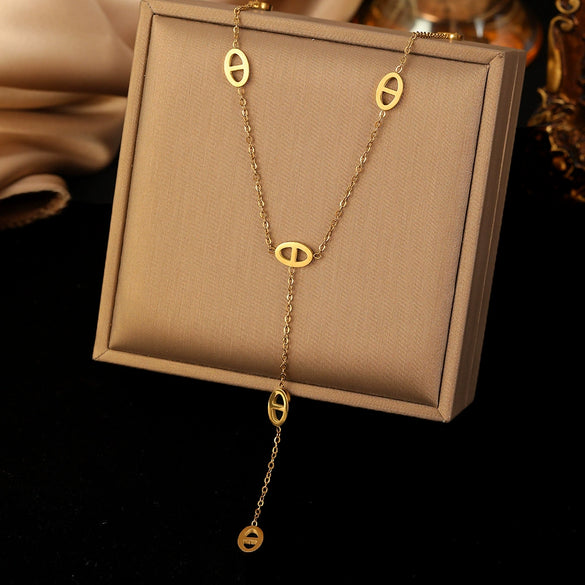 Women's Titanium Steel Hollow Oval Tassel Necklace And Bracelet Set Geometric O Chain Electroplated Simple Jewelry