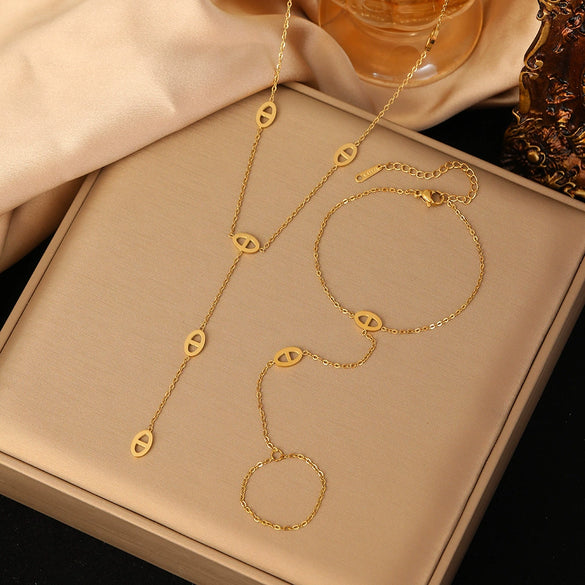 Women's Titanium Steel Hollow Oval Tassel Necklace And Bracelet Set Geometric O Chain Electroplated Simple Jewelry