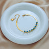 Women's Titanium Steel Jewelry Bracelet With Dripping Blue Eyes Shape And Electroplating Process