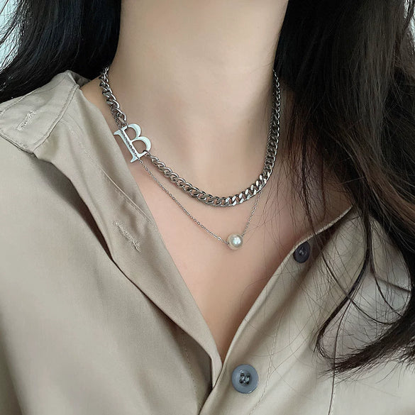 Women's Titanium Steel Stitching Design Specialshaped Baroque Pearl Necklace With Polishing Process And Bow Pattern