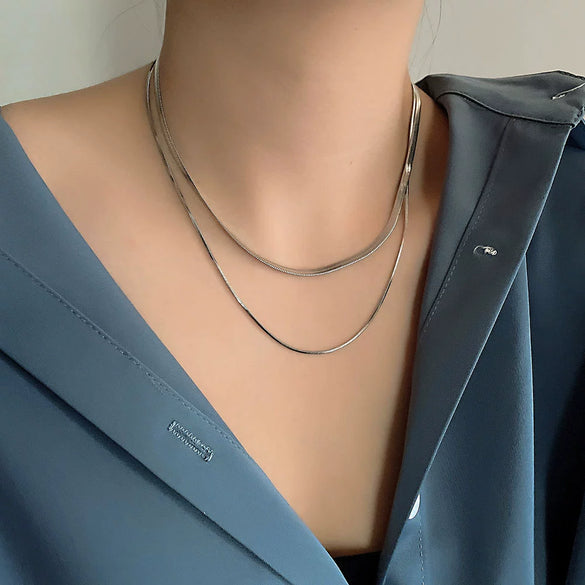 Women's Titanium Steel Stitching Design Specialshaped Baroque Pearl Necklace With Polishing Process And Bow Pattern