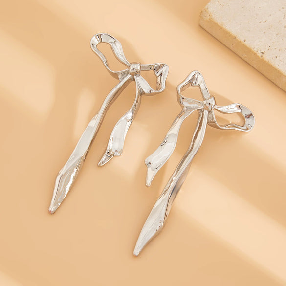 Women's Zinc Alloy Geometric Pleated Bowknot Tassel Earrings With Environmentally Friendly Electroplated Finish And Statement Design