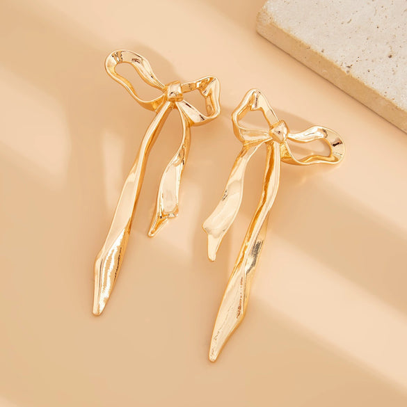 Women's Zinc Alloy Geometric Pleated Bowknot Tassel Earrings With Environmentally Friendly Electroplated Finish And Statement Design