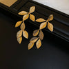 Women's Zinc Alloy Leaf Tassel Earrings Light Luxury Style Electroplating