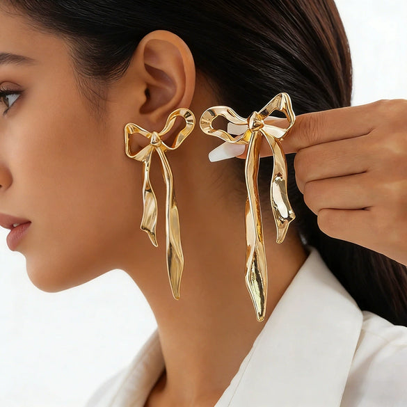 Women's Zinc Alloy Pleated Bowknot Stud Earrings With Geometric Floral Design And Ecofriendly Electroplated Finish