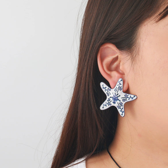 Women's Zinc Alloy Star Shaped Dripping Oil Fashion Earrings With Star Print
